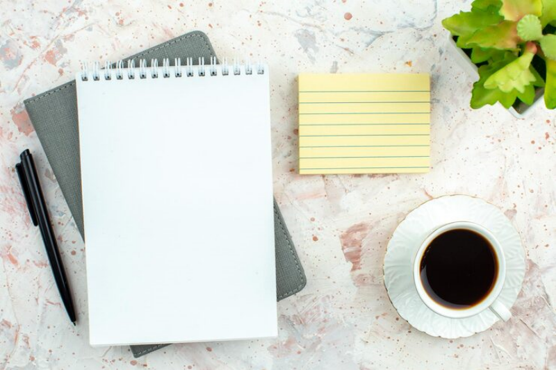 white notepad and memo pad